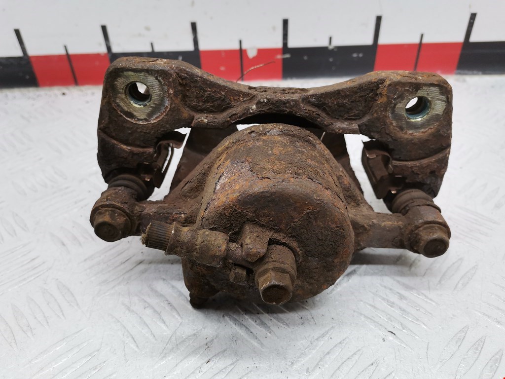 Суппорт передний правый DAEWOO Tacuma 2001-2011