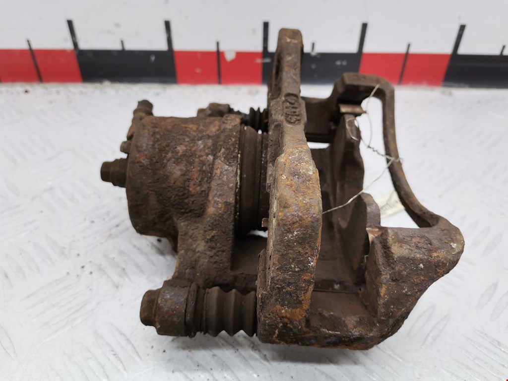 Суппорт передний правый DAEWOO Tacuma 2001-2011