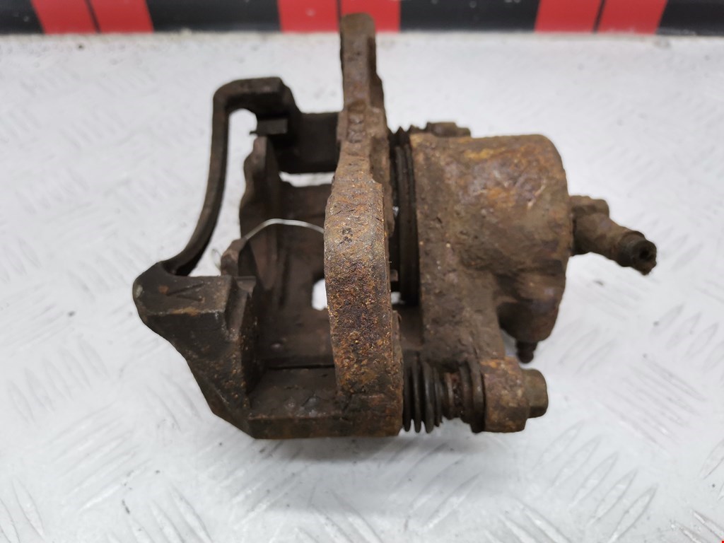 Суппорт передний правый DAEWOO Tacuma 2001-2011