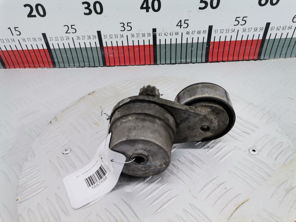 Натяжитель ремня генератора (приводного поликлинового ремня Opel Astra J (2009-2018)