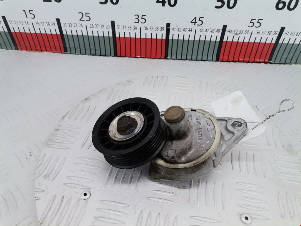Натяжитель ремня генератора (приводного поликлинового ремня Ford Focus 1 (1998-2005)