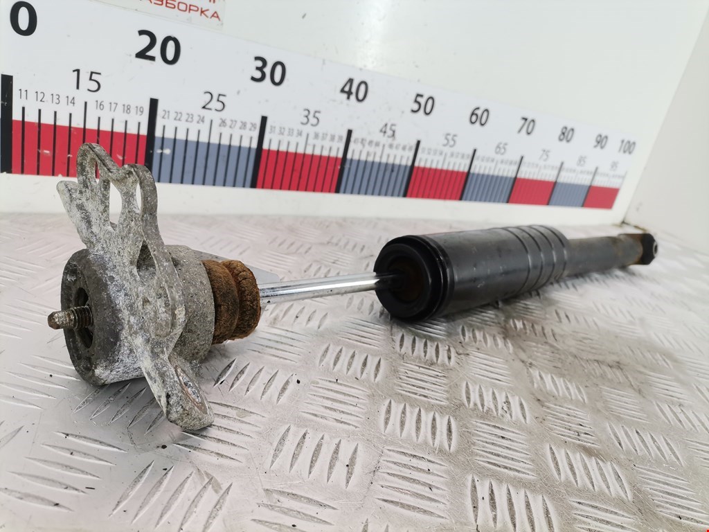 Амортизатор задний левый OPEL Corsa D 2006-2014