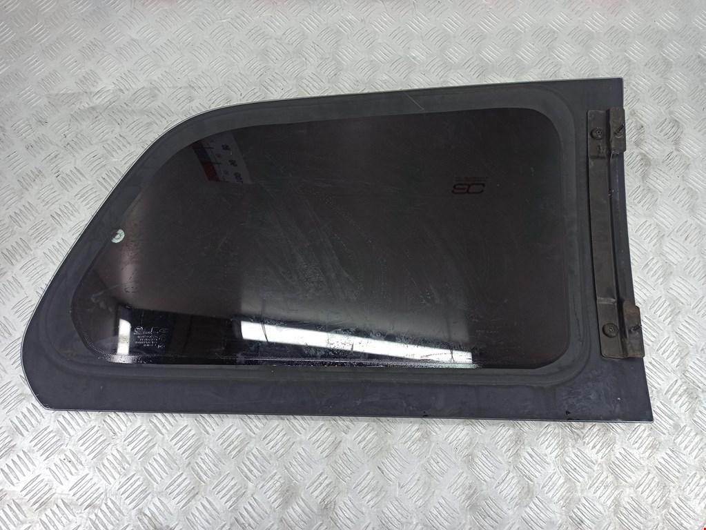 Стекло кузовное глухое левое KIA Carnival I 1999-2005