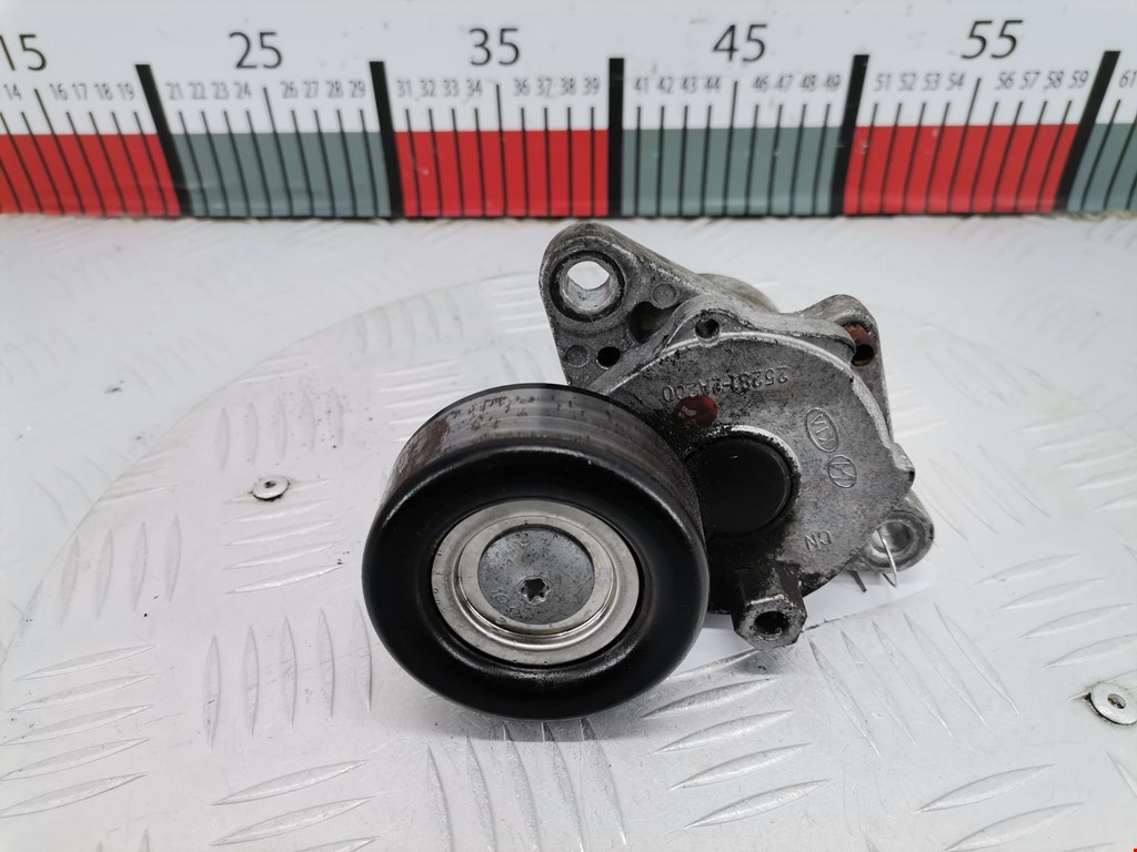 Натяжитель ремня генератора (приводного поликлинового ремня Hyundai i20 1 (2008-2014)