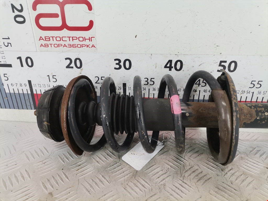 Амортизатор передний левый RENAULT Sandero 2009-2014