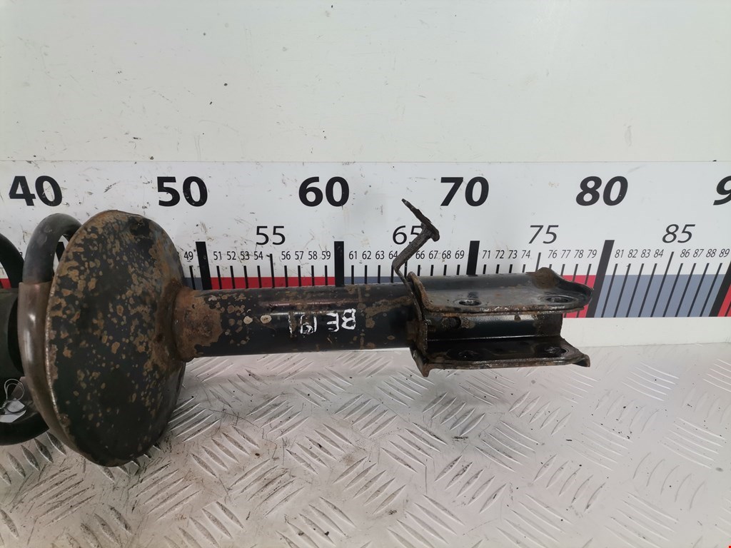 Амортизатор передний левый RENAULT Sandero 2009-2014