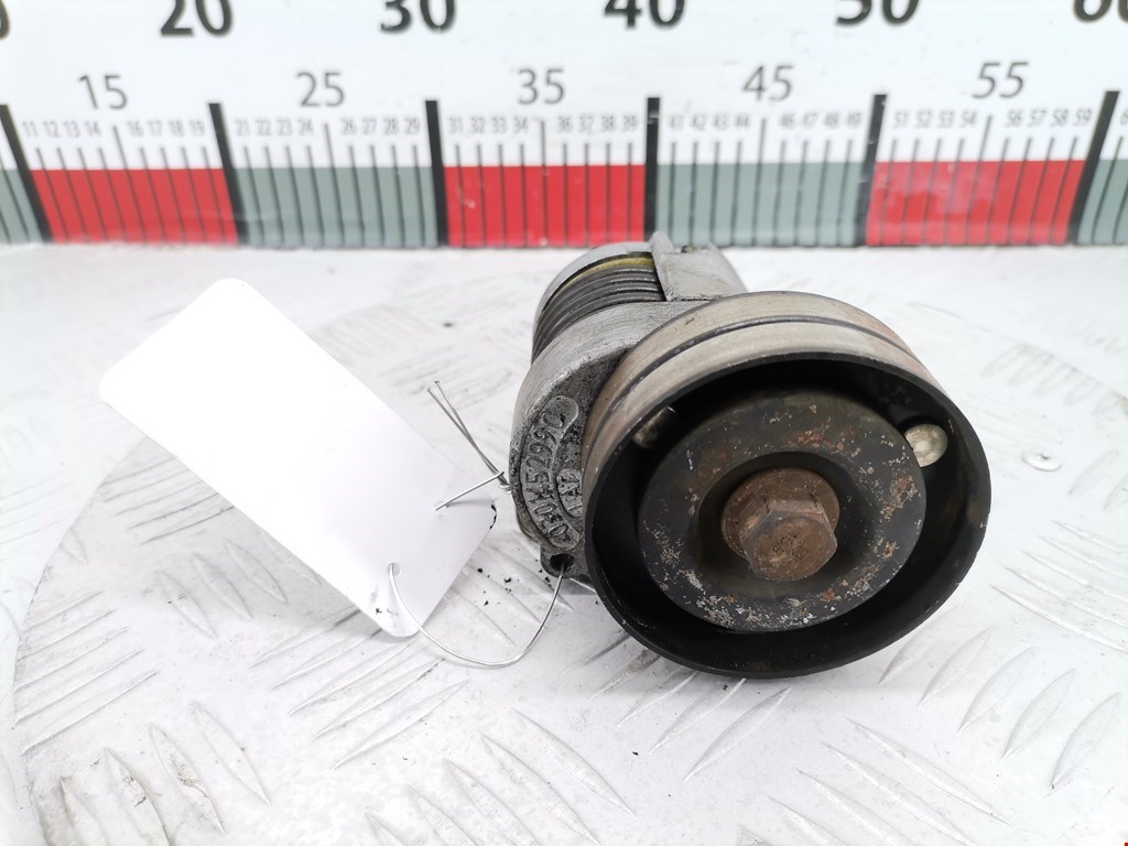 Натяжитель ремня генератора (приводного поликлинового ремня Volkswagen Golf 3 (1991-1999)