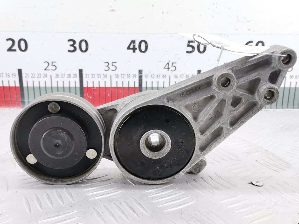 Натяжитель ремня генератора (приводного поликлинового ремня Volkswagen Passat 5 (1996-2000)