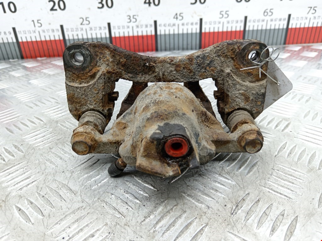 Суппорт задний левый SUBARU Outback 1999-2003