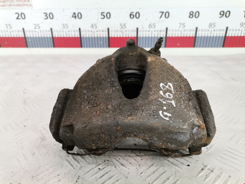 Суппорт передний левый OPEL Combo C 2001-2011