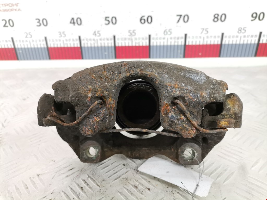 Суппорт передний левый OPEL Combo C 2001-2011