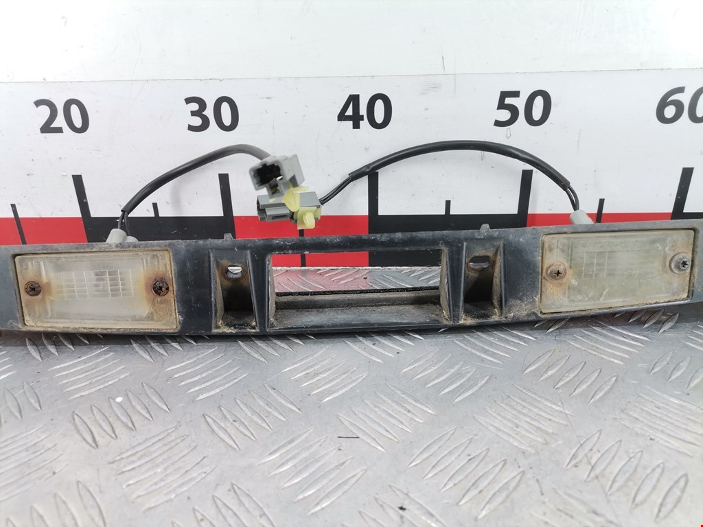 Фонарь подсветки номера KIA Carens 1999-2002