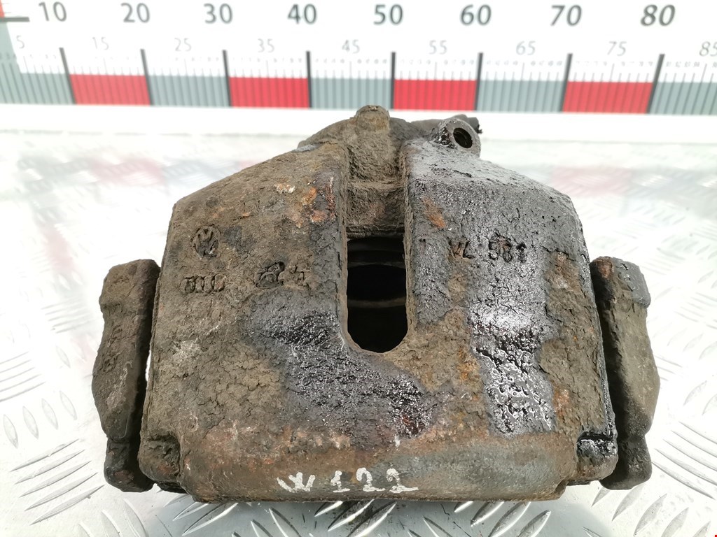 Суппорт передний левый VOLKSWAGEN Passat B6 2005-2011