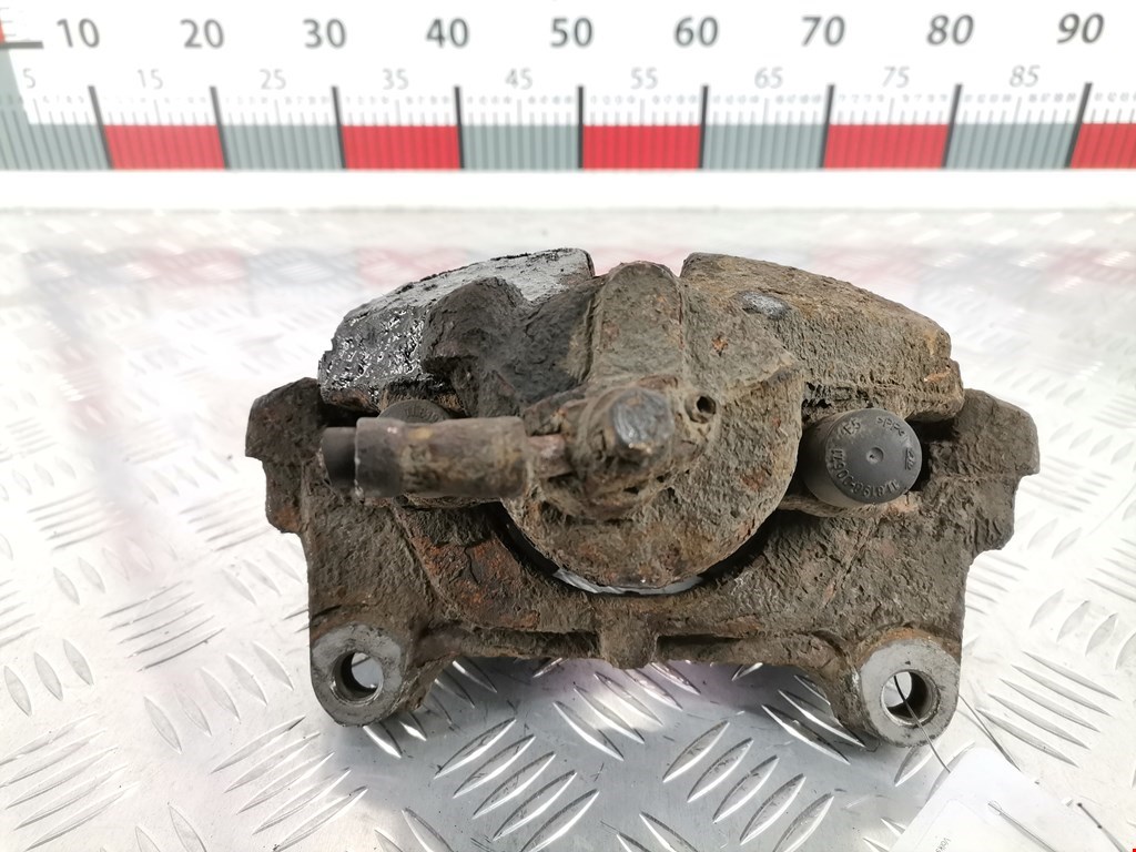 Суппорт передний левый VOLKSWAGEN Passat B6 2005-2011