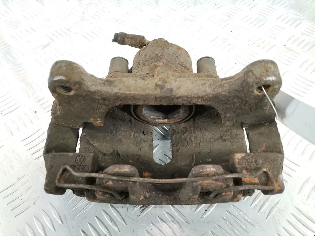 Суппорт передний левый VOLKSWAGEN Passat B6 2005-2011