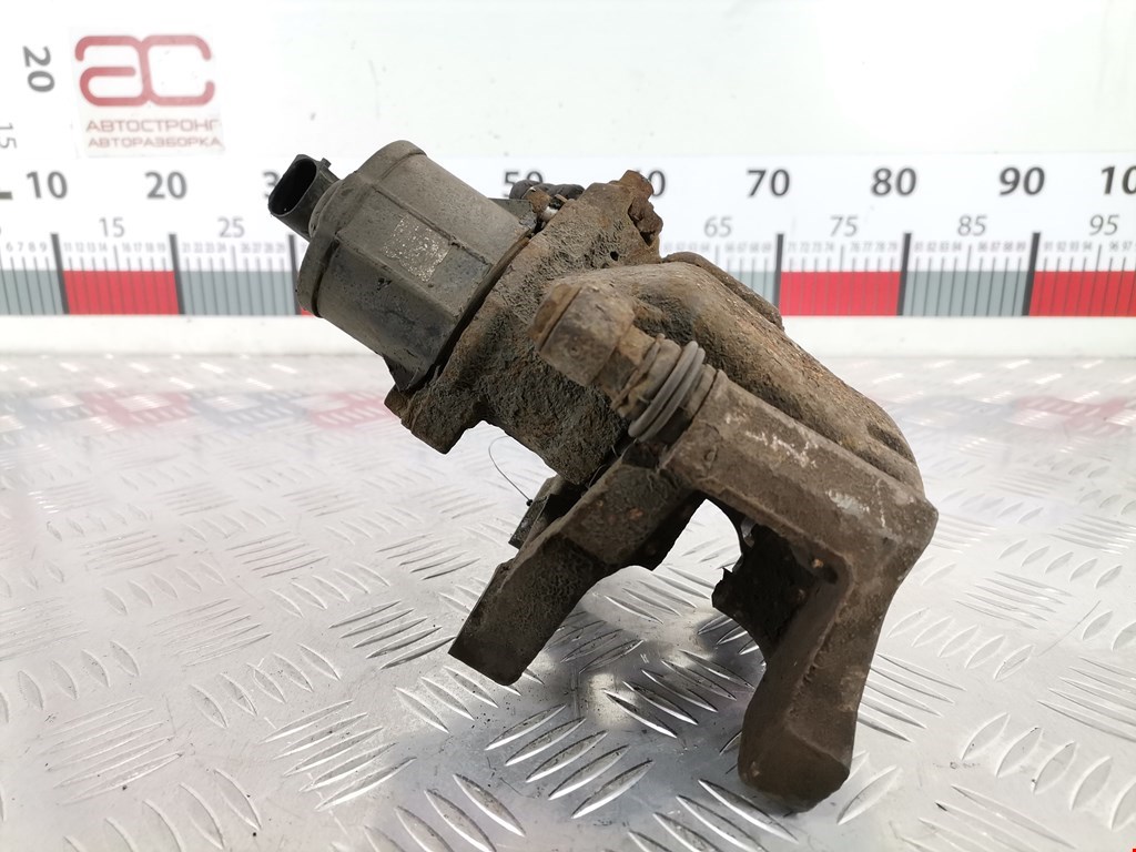 Суппорт задний левый VOLKSWAGEN Passat B6 2005-2011