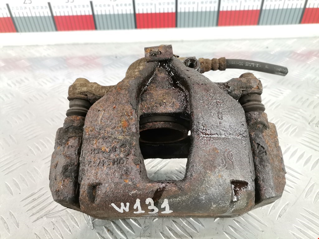 Суппорт передний левый FIAT Doblo 2 2009-2014