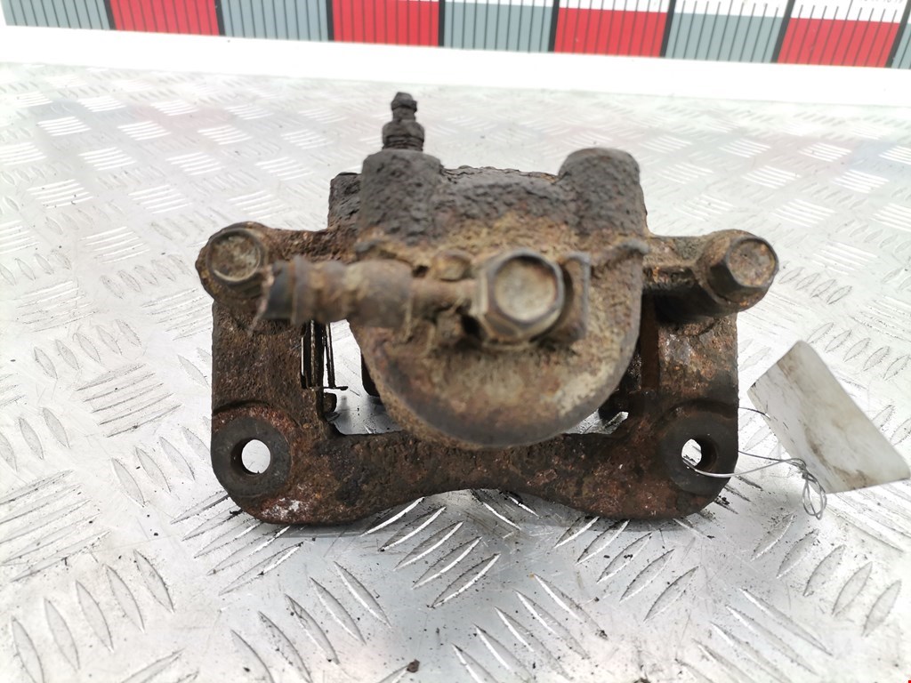 Суппорт передний левый SUZUKI Baleno 1995-2002