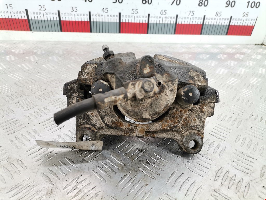 Суппорт передний левый VOLKSWAGEN Passat B6 2005-2011