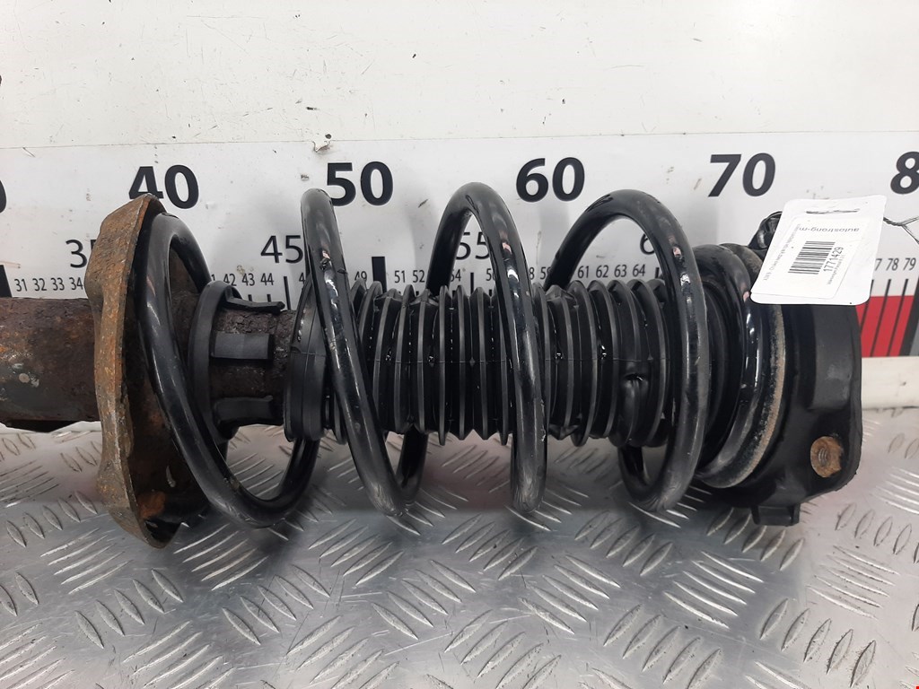 Амортизатор передний левый VOLKSWAGEN Passat B6 2005-2011