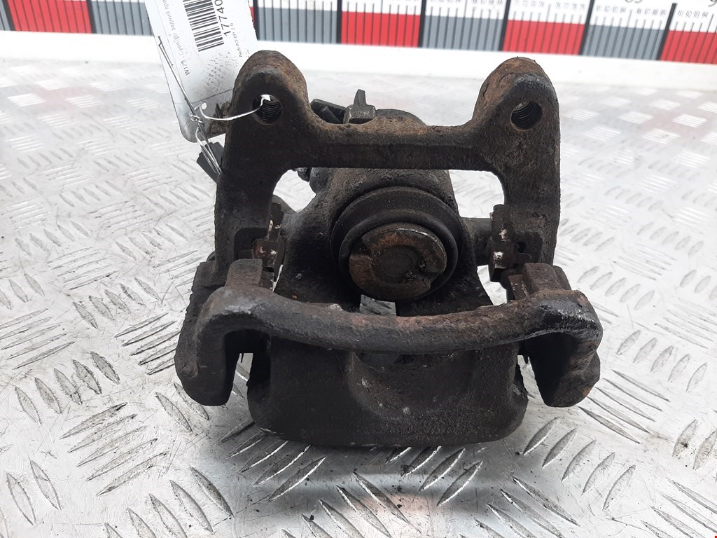 Суппорт задний левый AUDI A3 8P 2003-2013