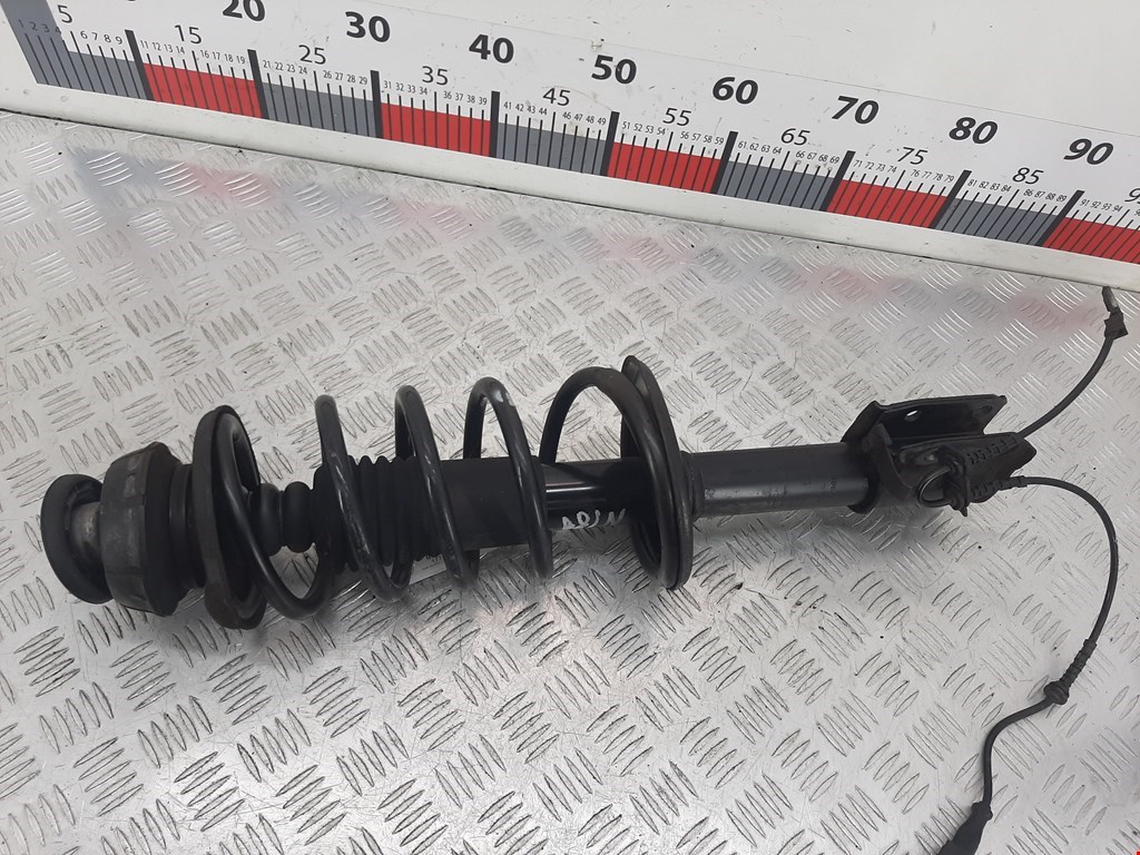 Стойка амортизатора переднего правого Renault Sandero 1 (2007-2014)