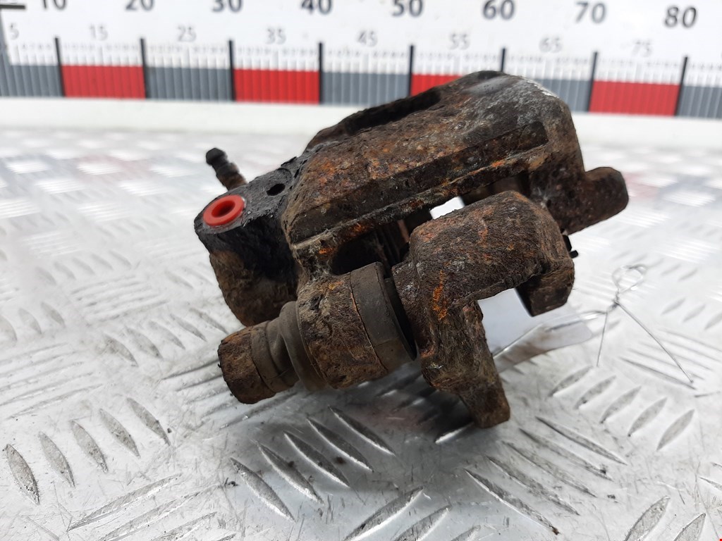 Суппорт задний левый TOYOTA Prius II XW20 2003-2012