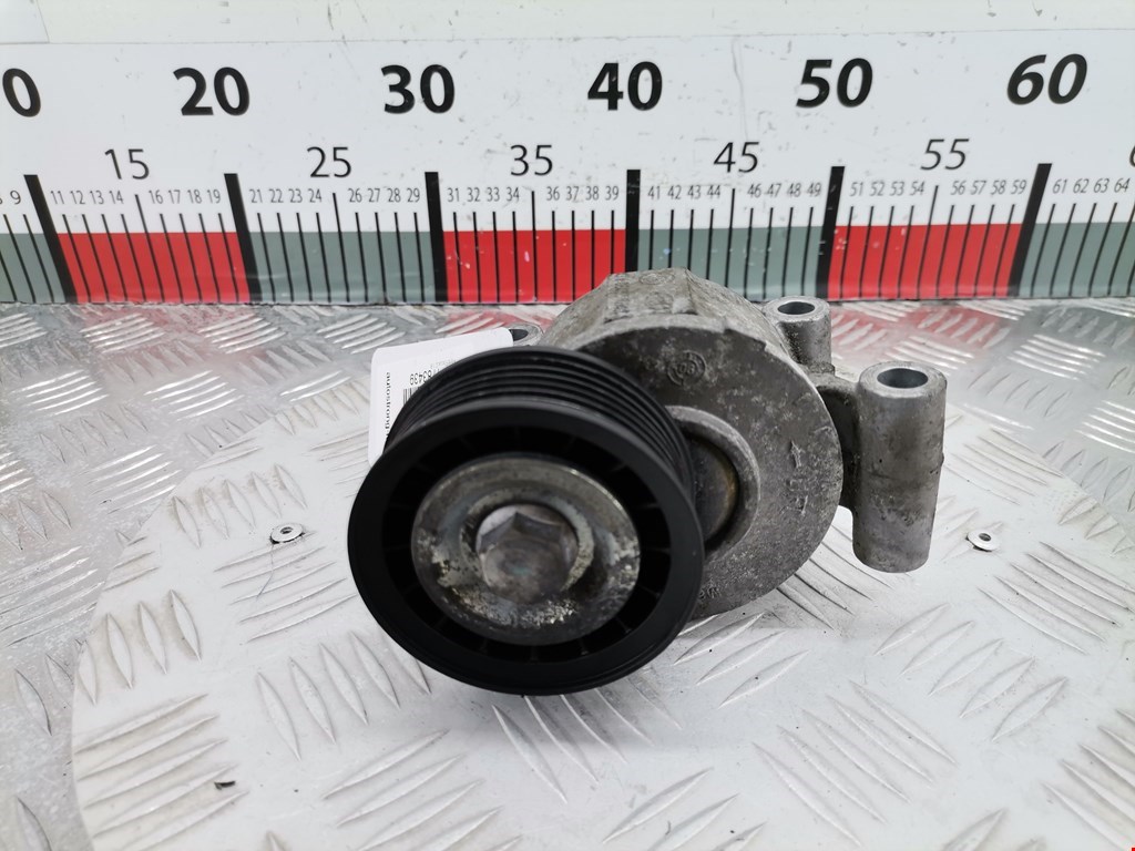 Натяжитель ремня генератора (приводного поликлинового ремня Ford Focus 2 (2004-2011)