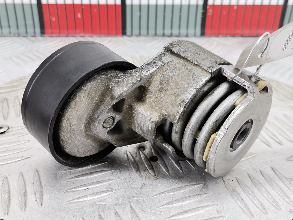 Натяжитель ремня генератора (приводного поликлинового ремня Renault Sandero 1 (2007-2014)