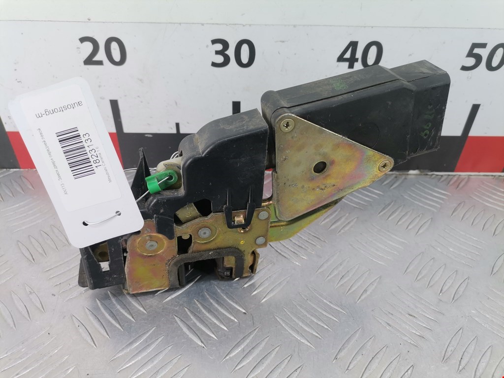 Замок двери передней левой MITSUBISHI Carisma 1995-1999