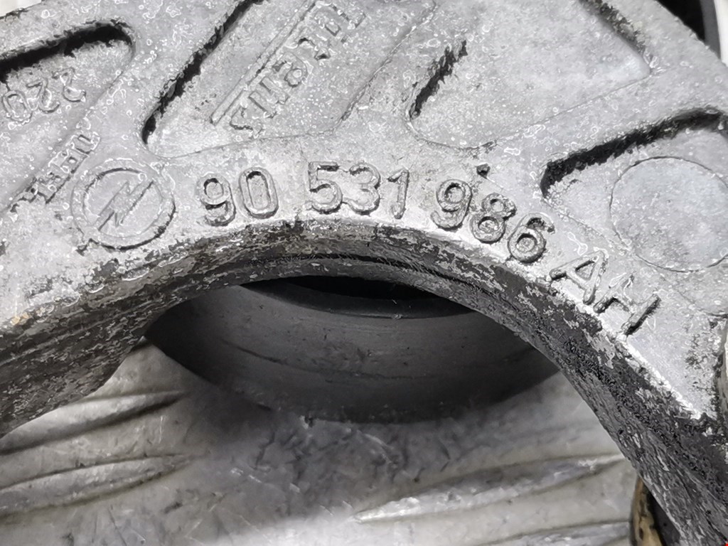 Натяжитель ремня генератора (приводного поликлинового ремня Opel Corsa D (2006-2014)