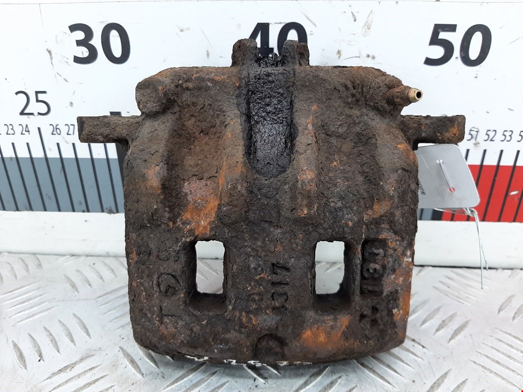 Суппорт передний правый SUBARU Legacy 1998-2004