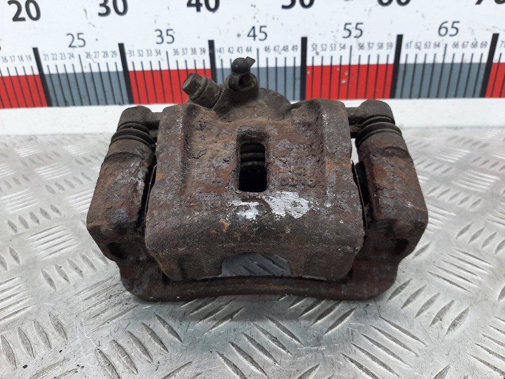 Суппорт задний левый KIA Carnival II 2006-2014