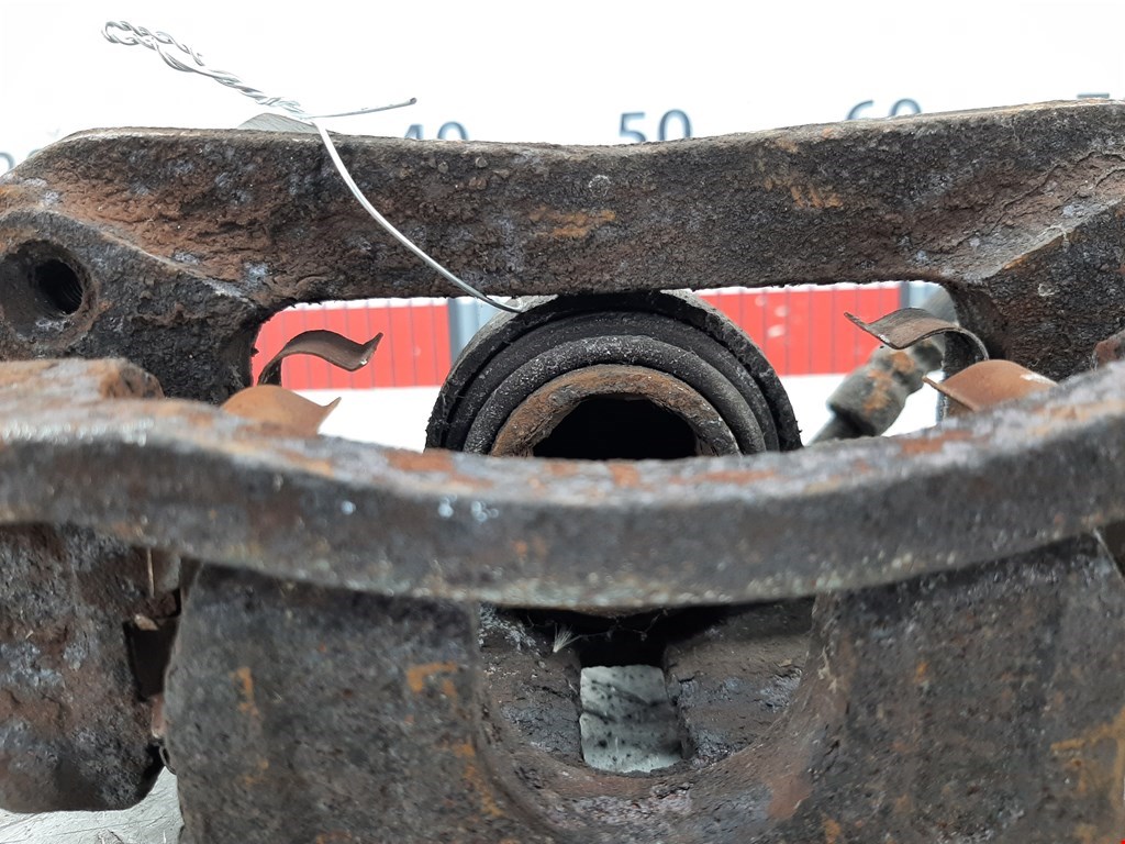 Суппорт задний левый KIA Carnival II 2006-2014