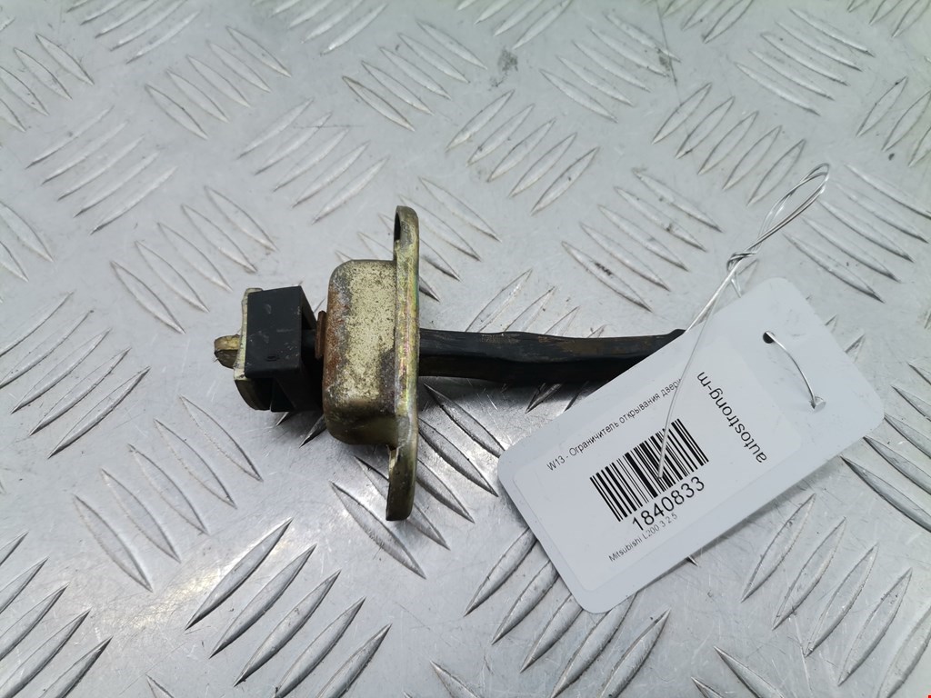 Ограничитель открывания двери MITSUBISHI L200 K6,K7 1996-2006
