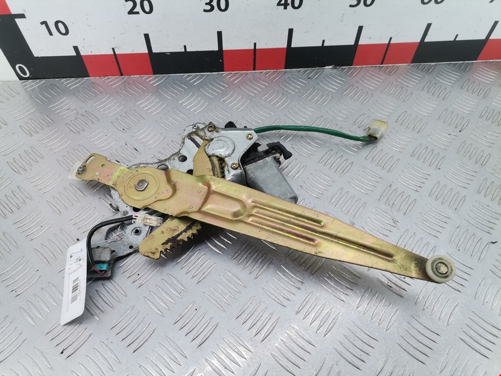 Стеклоподъемник задний левый MITSUBISHI L200 K6,K7 1996-2006