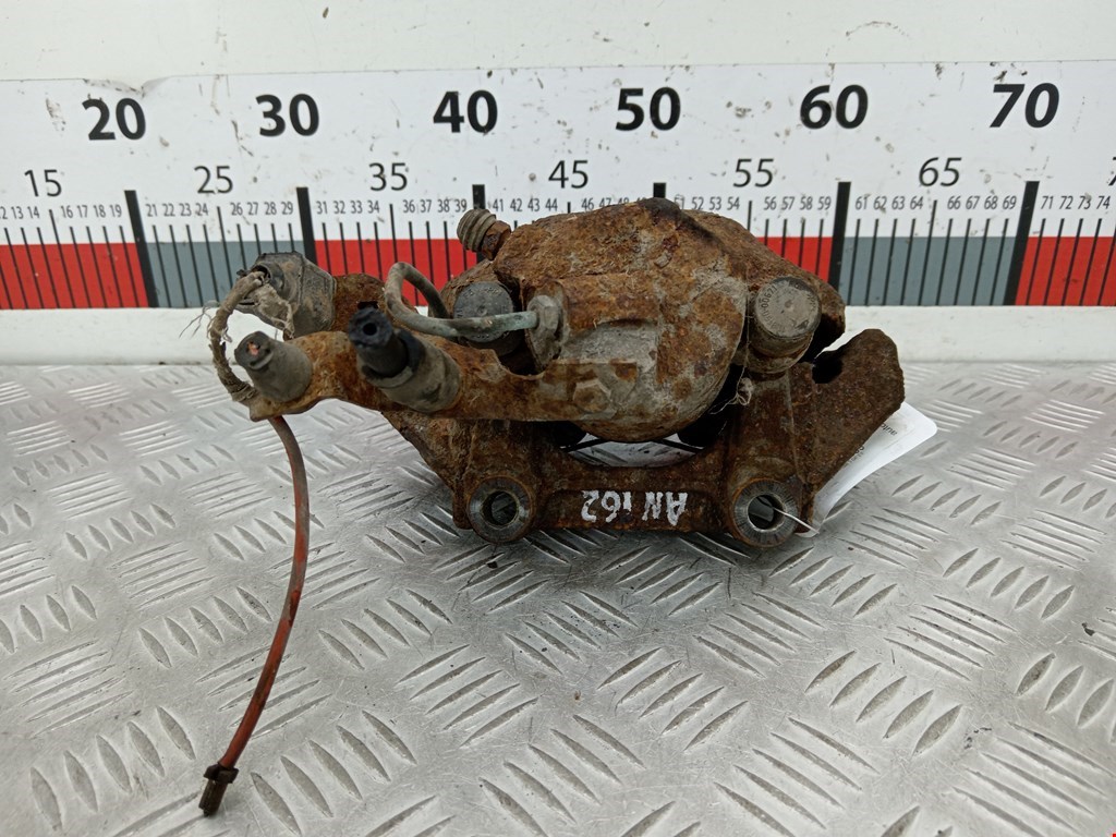 Суппорт передний правый VOLKSWAGEN Passat B5 1997-2005