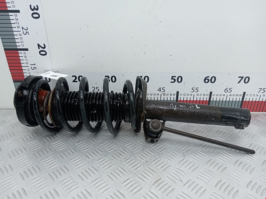 Стойка амортизатора переднего левого Volkswagen Caddy 3 (2004-2015)