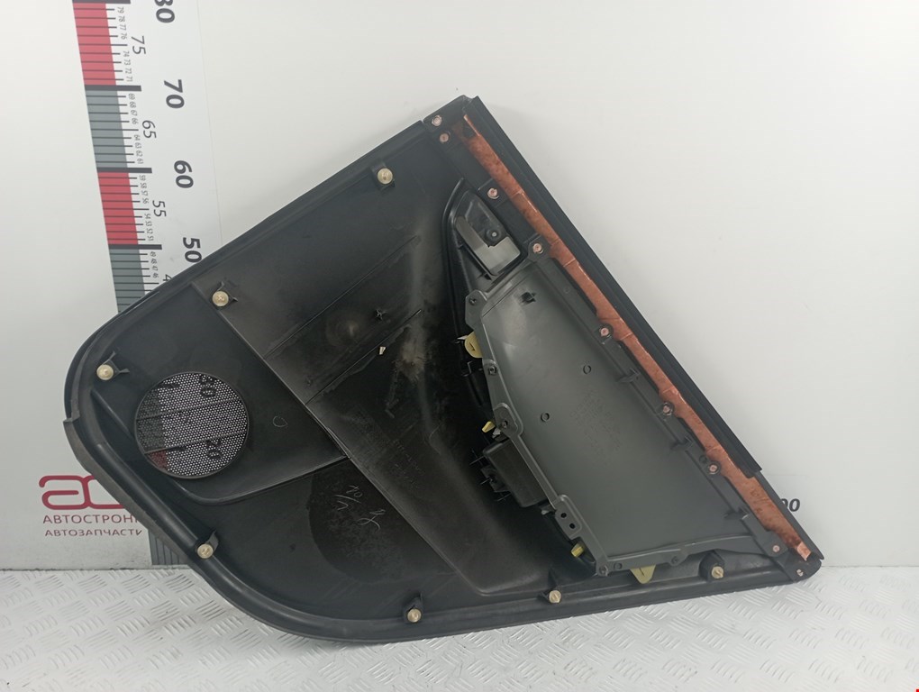 Обшивка двери задняя левая TOYOTA Corolla E120 2001-2006
