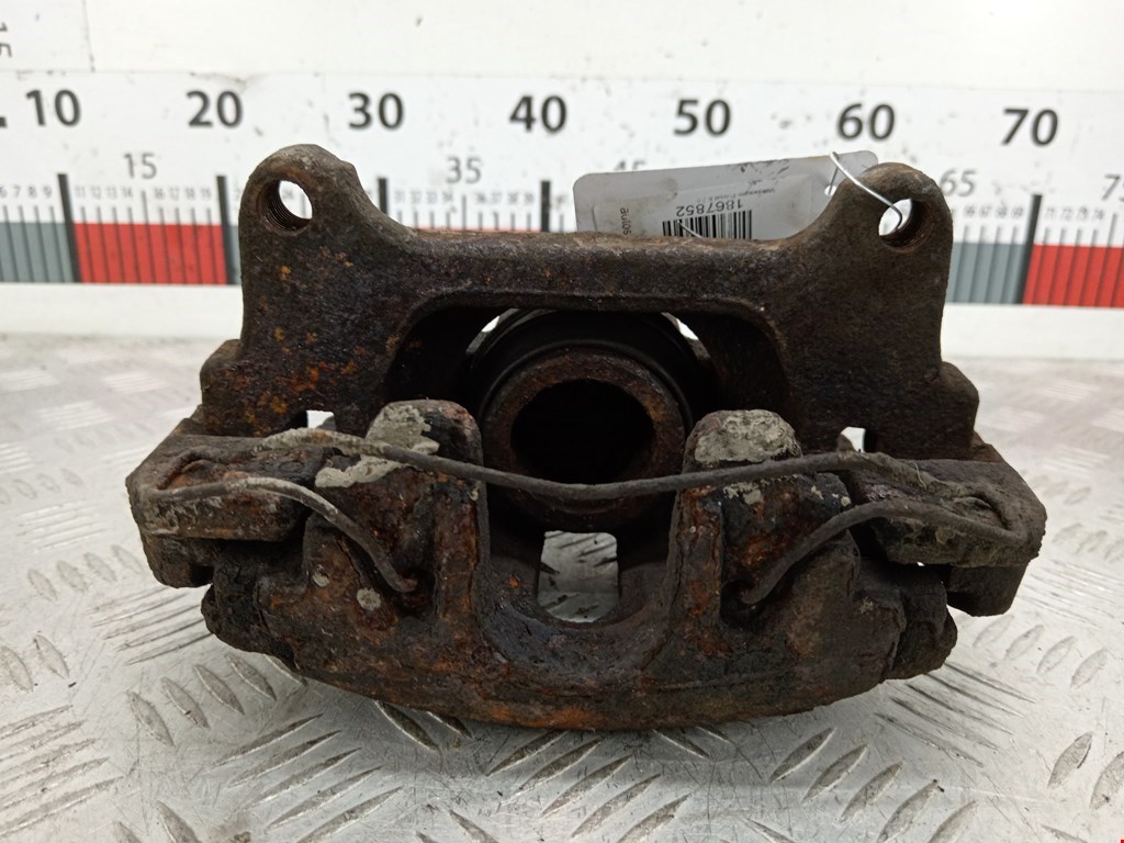 Суппорт передний левый VOLKSWAGEN Passat B6 2005-2011