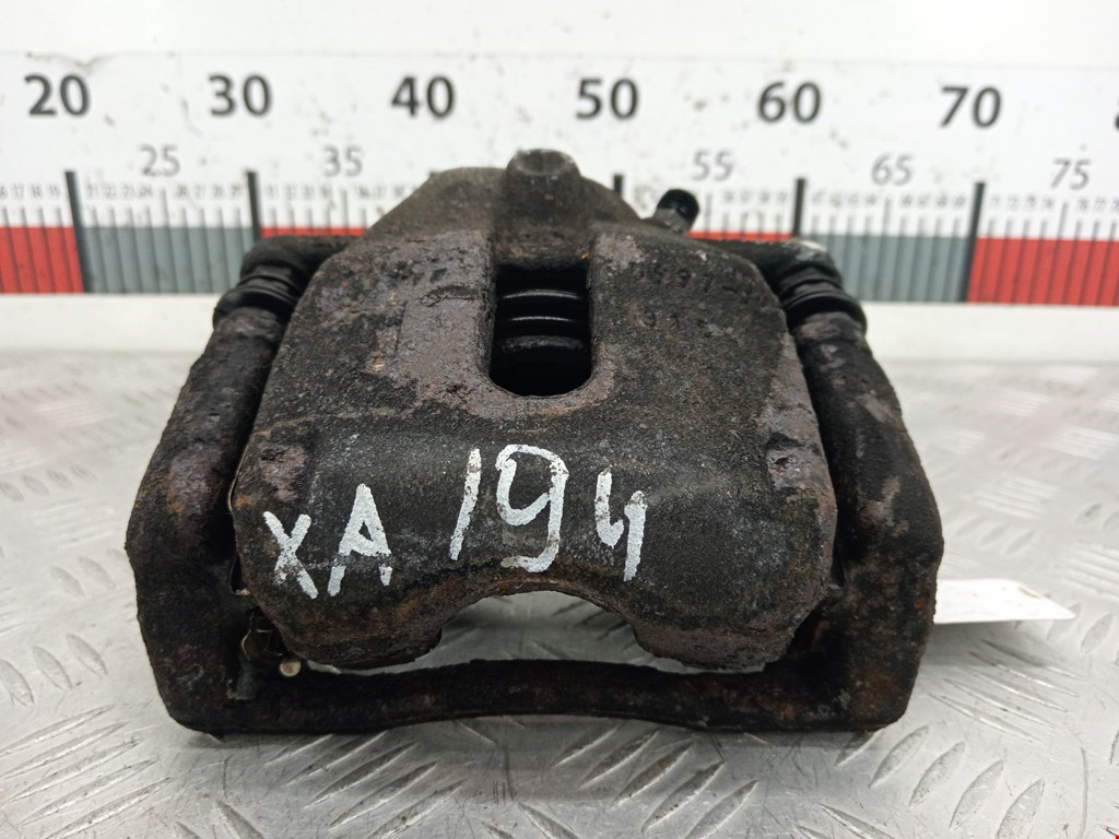 Суппорт передний левый SUZUKI Splash 2008-2015