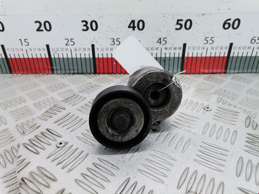 Натяжитель ремня генератора (приводного поликлинового ремня Opel Corsa C (2000-2006)