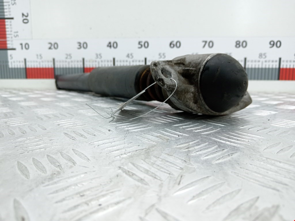 Амортизатор задний левый VOLKSWAGEN Passat B7 2011-2015