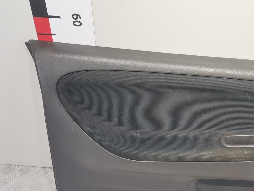 Обшивка двери передняя левая MITSUBISHI Colt CJ 1995-2003