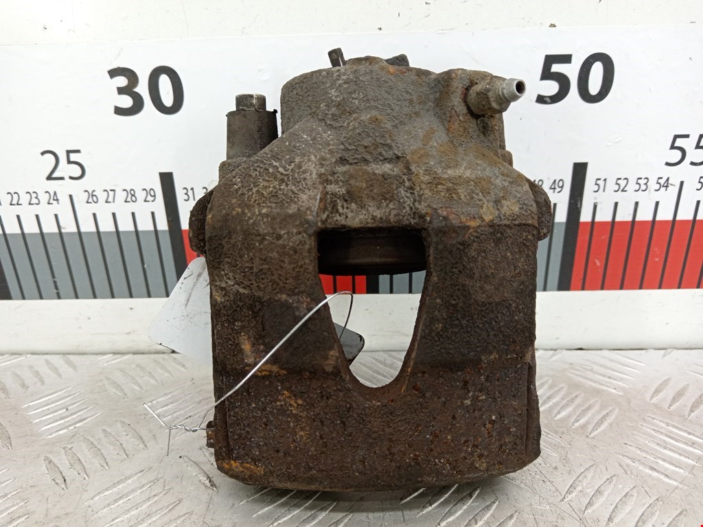 Суппорт передний левый Volkswagen Caddy 3 (2004-2015)