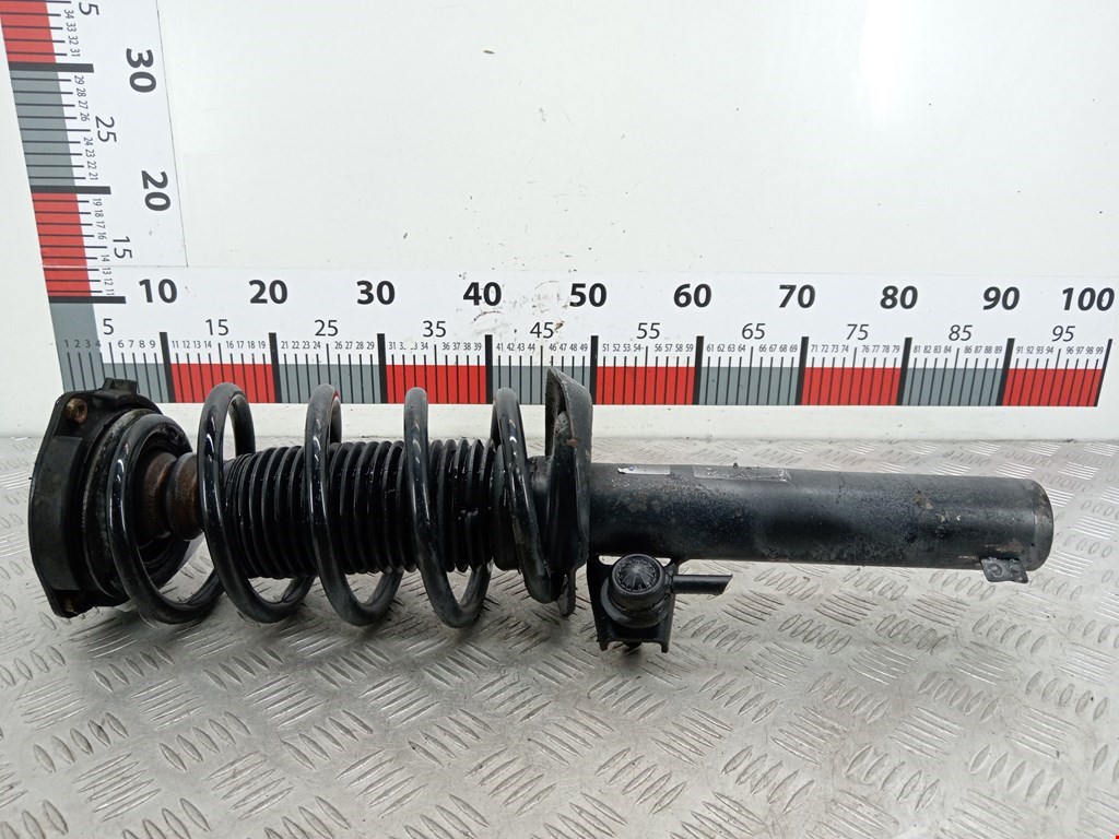 Амортизатор передний левый VOLKSWAGEN Passat B7 2011-2015