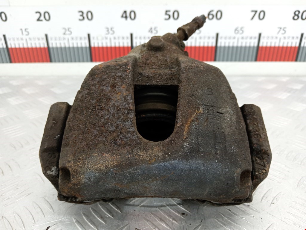 Суппорт передний левый Ford Focus 2 (2004-2011)