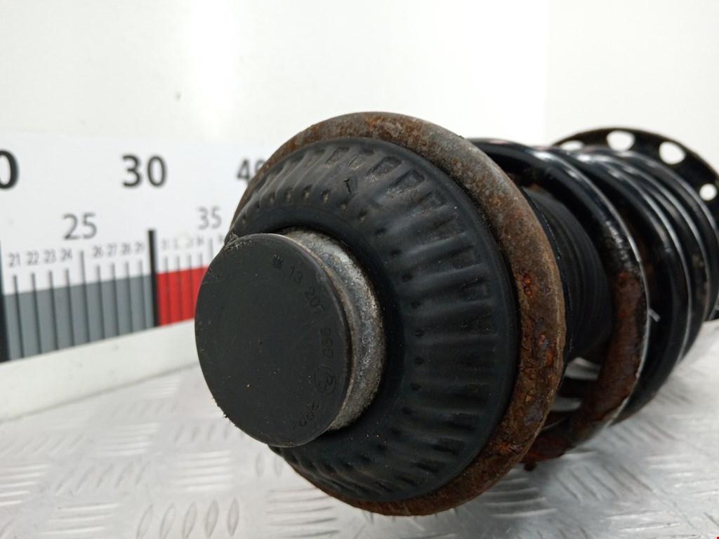 Амортизатор передний левый OPEL Astra H/Family 2004-2015