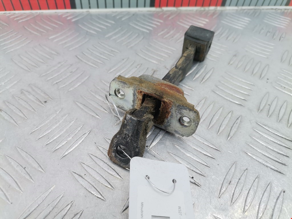 Ограничитель открывания двери MITSUBISHI L200 KB 2006-2015