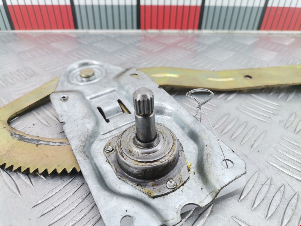 Стеклоподъемник задний правый FORD Escort 1990-1995